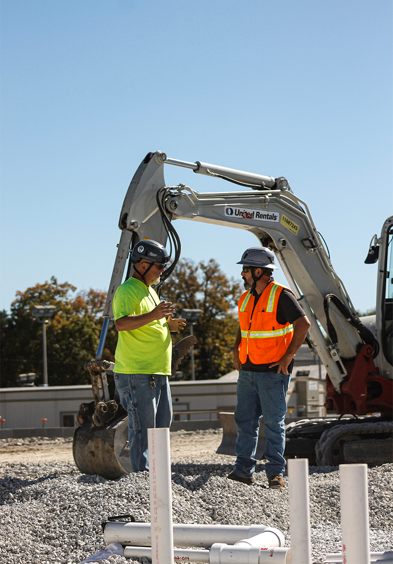 workers talking on site